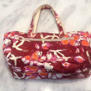 Authentic Chanel vinyl Camelia pool bag